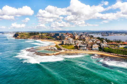 Newcaste in NSW of Australia - Pacific coast waterfront at Hunter river mouth. Aerial scenic landscape.